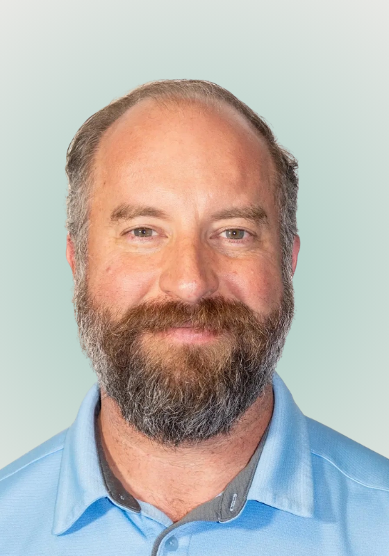 THIS ONE_ Dr. Dan Headshot (Gradient)